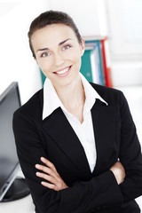 Beautiful young businesswoman at office