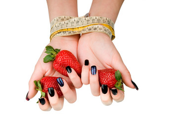 Strawberry in the female   hands.