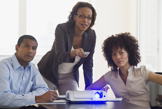 African business people watching slideshow