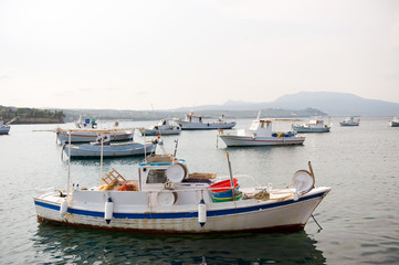 Naklejka na ściany i meble Fishery harbor with boats