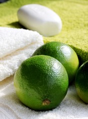 soap on towel with fresh limes
