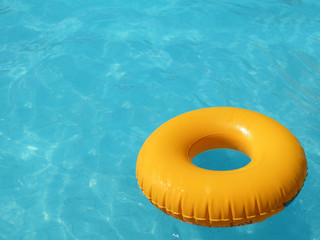 Yellow Lifebuoy in Pool