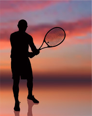 Tennis Player on Sunset Background