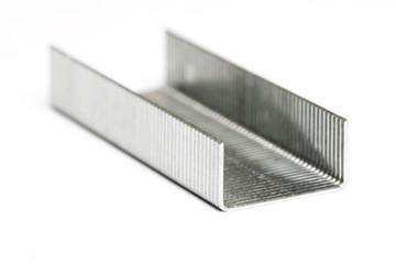 Strip of staples on its back