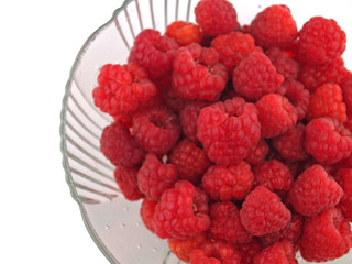 Raspberries Close Up in a Bowl on White