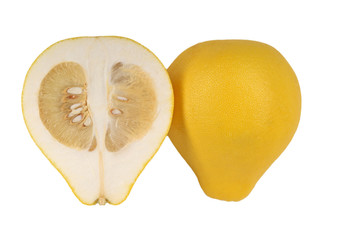 Two halves of fruit pomelo lie nearby