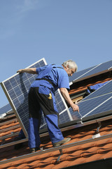 Workman with solar paneel