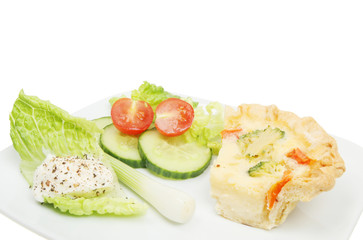 Closeup of quiche and salad