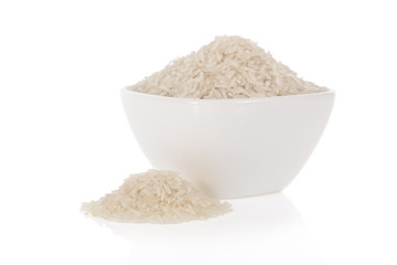 Long white rice in a bowl isolated on a white background