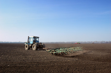 Obraz premium Tractor in The Field
