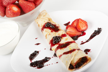 pancakes with fruits, strawberry and chocolate