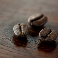 Coffee beans on wooden table