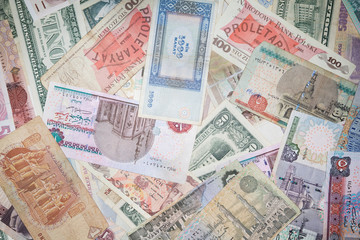 Background from banknotes of various monetary currencies