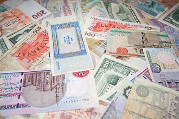Background from banknotes of various monetary currencies