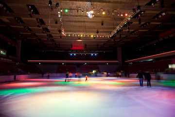 big covered skating rink with multi-coloured illumination