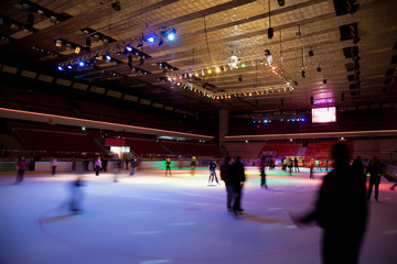 big covered skating rink with multi-coloured illumination