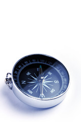 magnetic compass closeup on white background