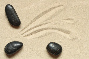 Fototapeta na wymiar Stones On Sand
