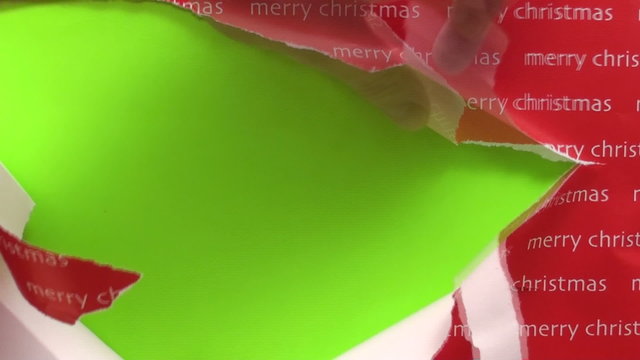 Unwrapping Christmas gift to reveal green screen V3 - HD