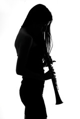 woman with a clarinet - black and white