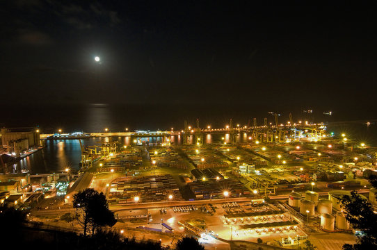Night Panoramic view of containers in a harbour of Barcelona