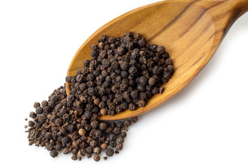 black pepper corns over the spoon