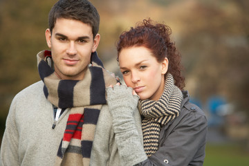 Fototapeta premium Romantic Teenage Couple In Autumn Landscape