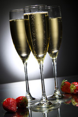 Glass of champagne with strawberry