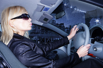 Young woman driving car