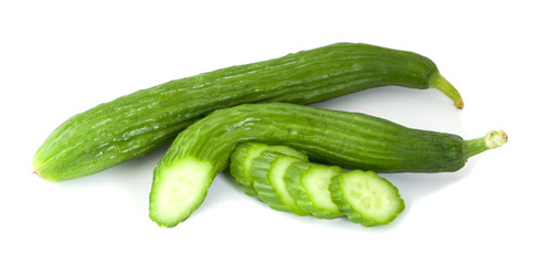 Cucumbers isolated over white. Once sliced.