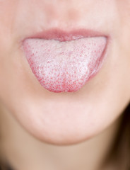 thongue of a young girl