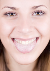 Obraz premium thongue of a young girl