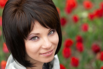Naklejka premium Pretty girl with tulips