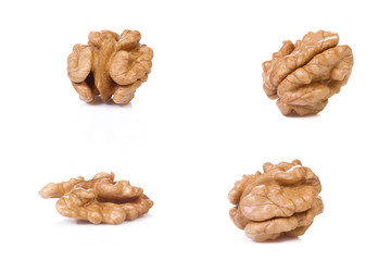 four walnuts at white background