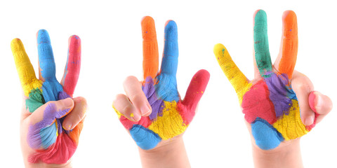 Little boy’s colorful hands with 3 fingers up - high resolution