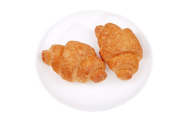 Fresh buns on a plate isolated