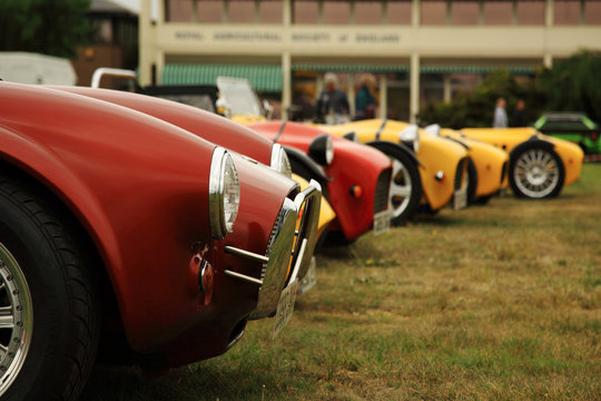 Fototapeta Red and yellow sports cars