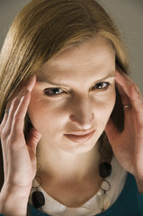 woman in migraine near