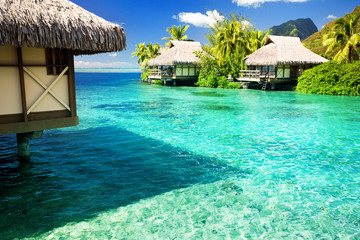 Over water bungalows with steps into amazing lagoon