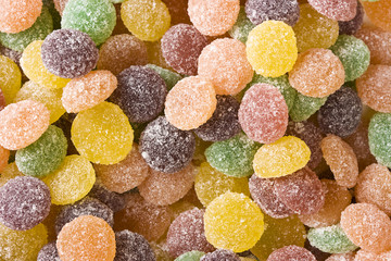 Colorful background of sugar coated gummy candy