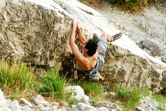 climber on a boulder