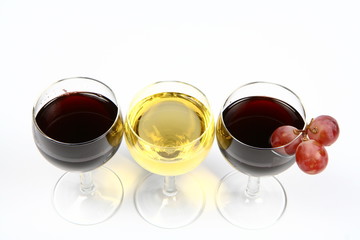 Red and white wine in wineglasses with space for text