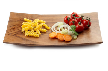 fusilli pasta with vegetables ingredients ready to cook