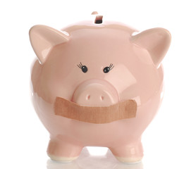 piggy bank with tape on her mouth