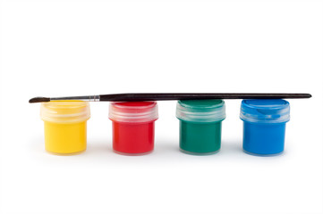Gouache paint cans and brush