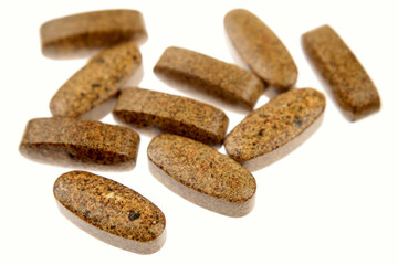 Brown capsules tablets pills