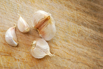 Fresh garlic on chopping board