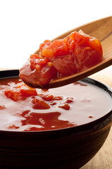raw tomato pulp over the spoon
