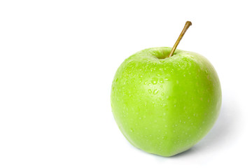 wet green apple on the white background
