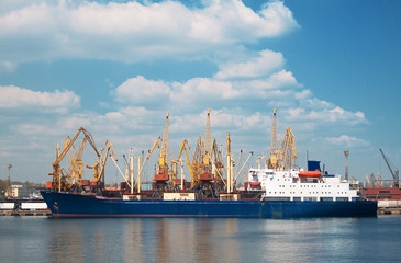 A cargo ship docked in the port